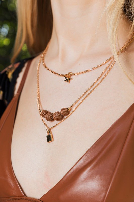 Three Layered Rustic Gold Charmed Necklace - My Threaded Apparel | Online Women's Boutique - necklace
